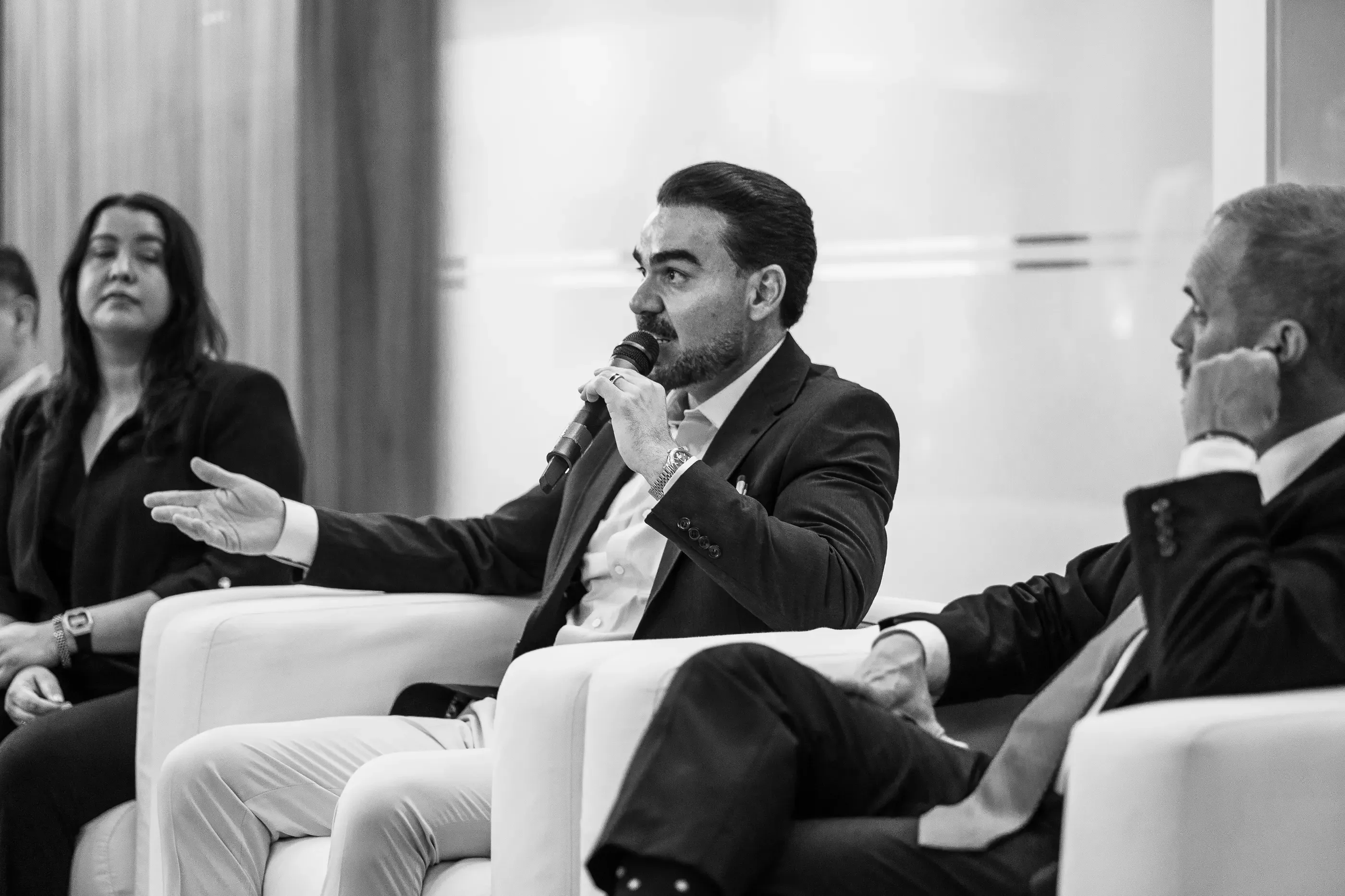 Panelist speaking at the LAFISE Business Forum